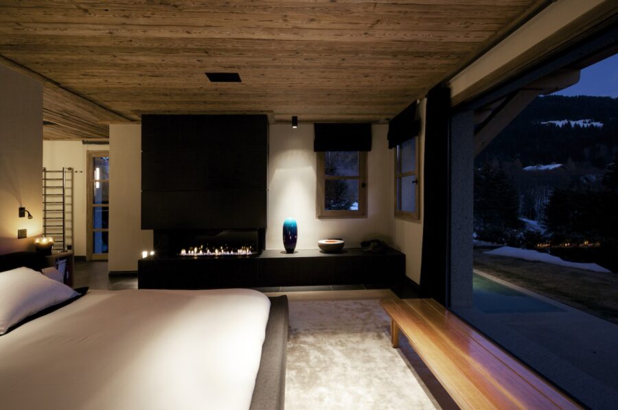 Chalel-Sybil-bedroom-fireplace-modern-elegant-sleek-design-scenicviews-mont-darbois-megeve