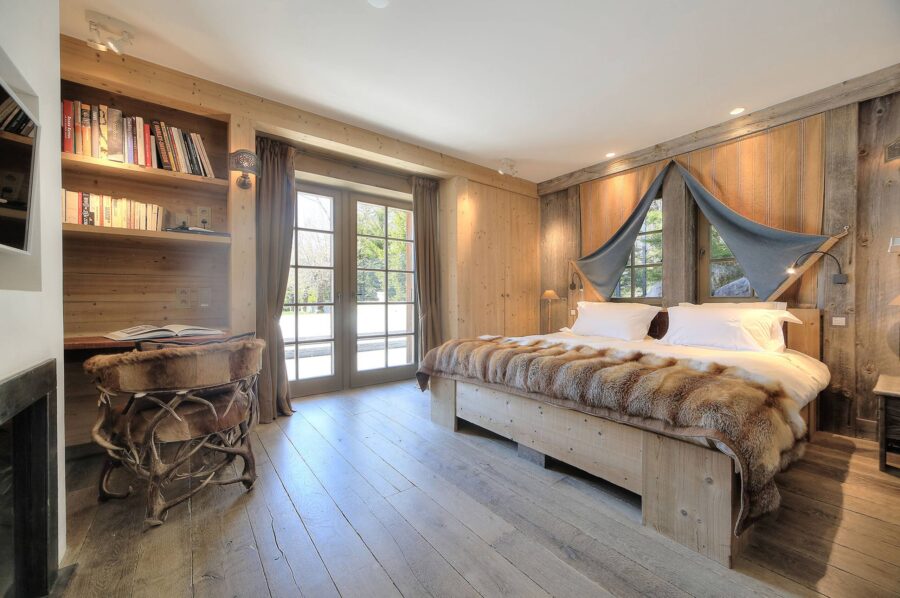 Chalet-Izabelle-bedroom-luxury-modern-alpine-interior-fireplace-cosy-megeve