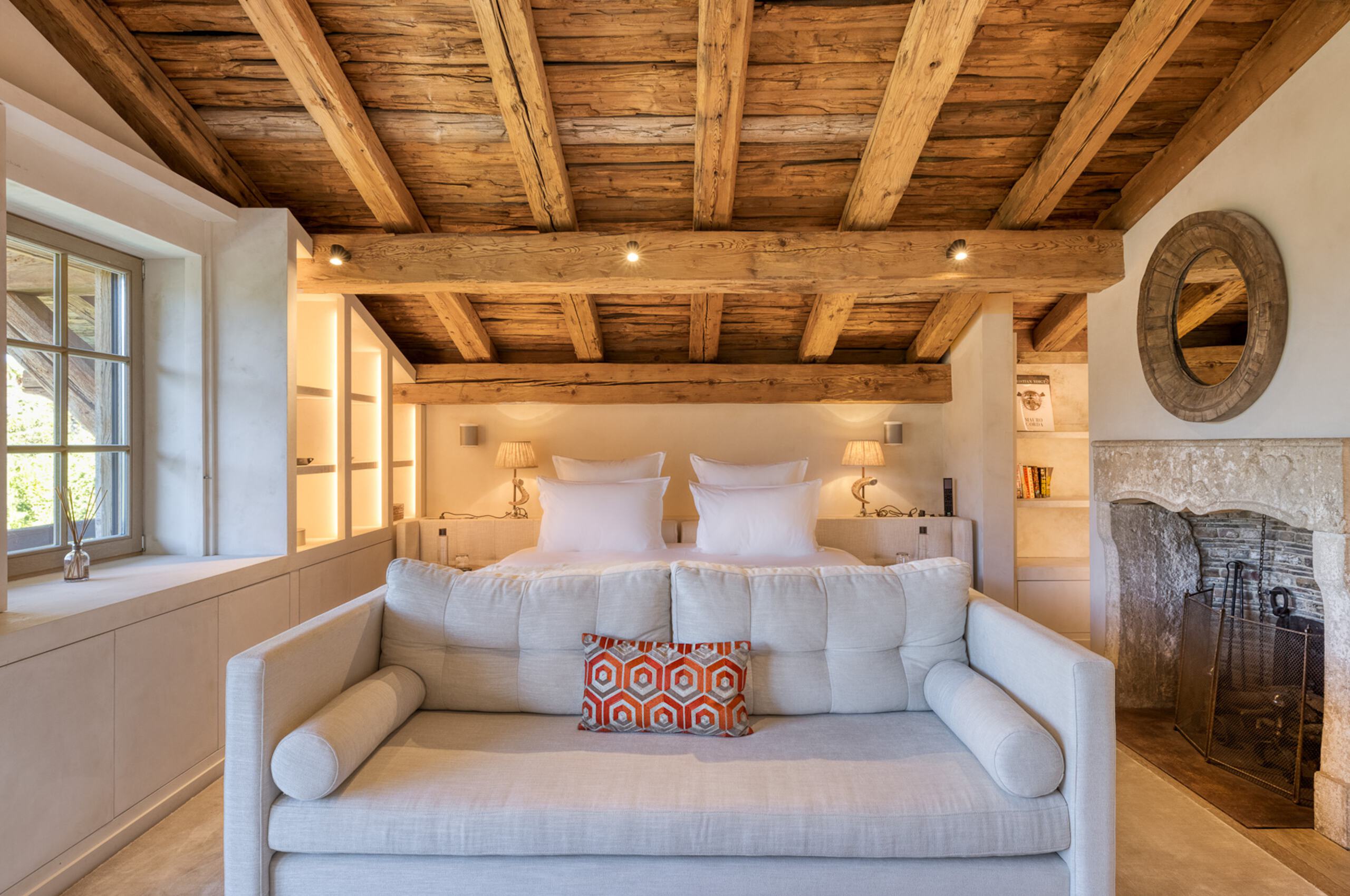 Chalet-Izabelle-mastersuite-bedroom-beams-luxury-furnishings-bespoke-interiors-megeve