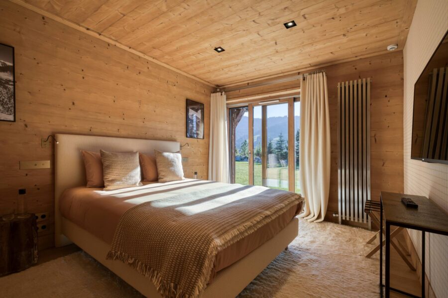 Chalet-atina-bedroom-mountainview-terrace-tranquil-elegant-modern-interior-luxury-megeve-mont-d'arbois