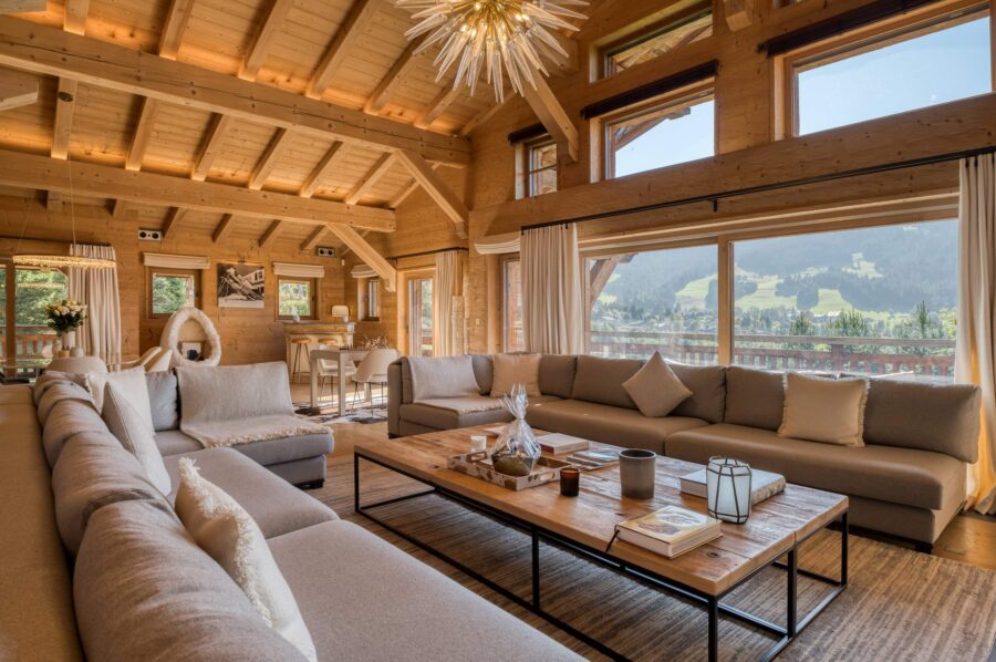 Chalet-atina-livingroom-large-spacious-openplan-mountain-views-elegant-modern-stylish-luxury-interiordesign-megeve-mont-d'arbois