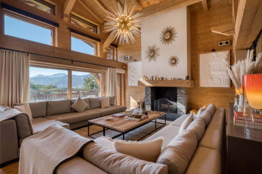 Chalet-atina-mainpage-livingroom-lounge-fireplace-mountainview-luxury-interior-design-megeve-mont-d'arbois