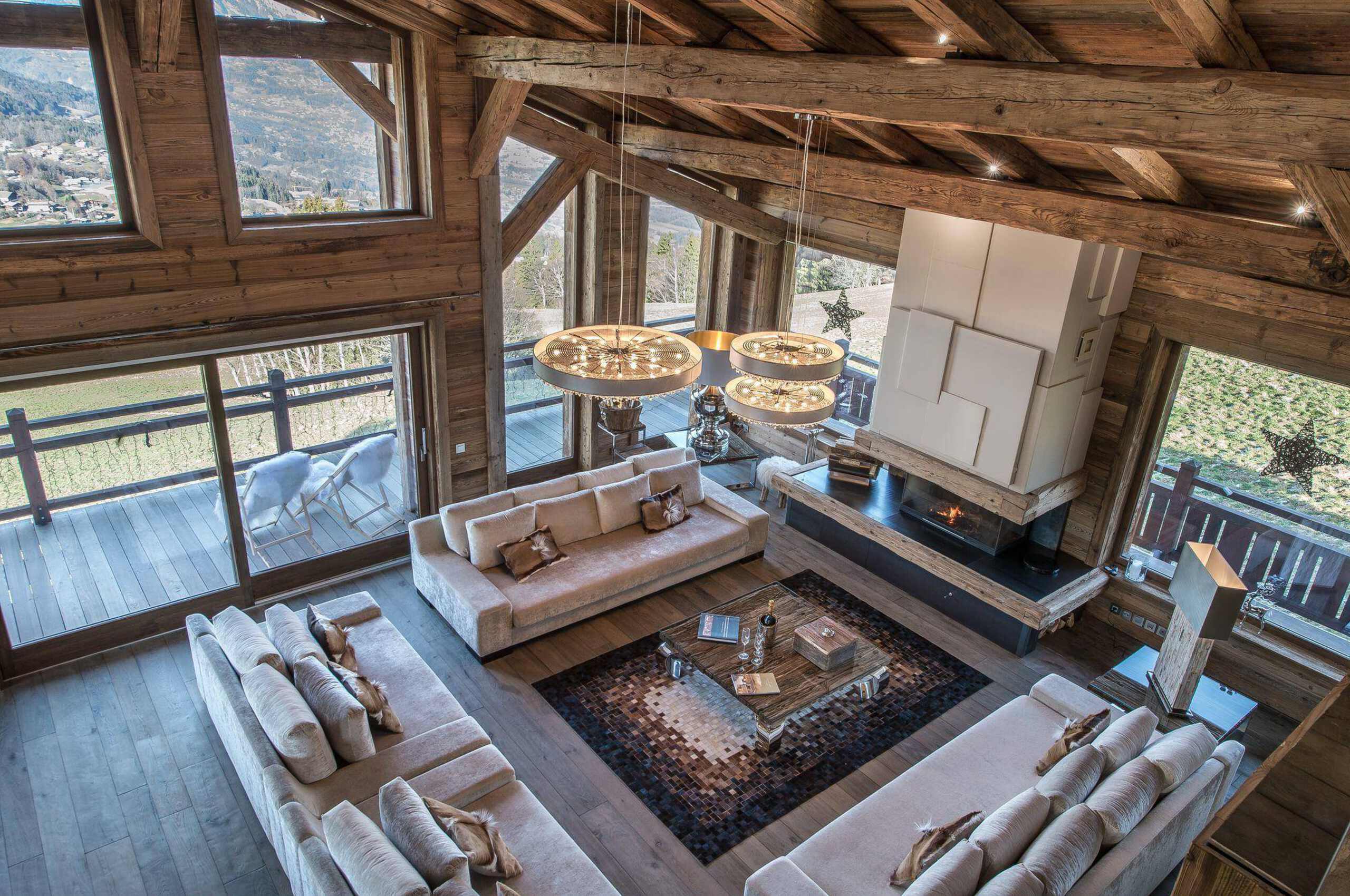 chalet-araceli-livingroom-balcony-fireplace-elegant-modern-alpine-interiors-luxury-megeve-princesse