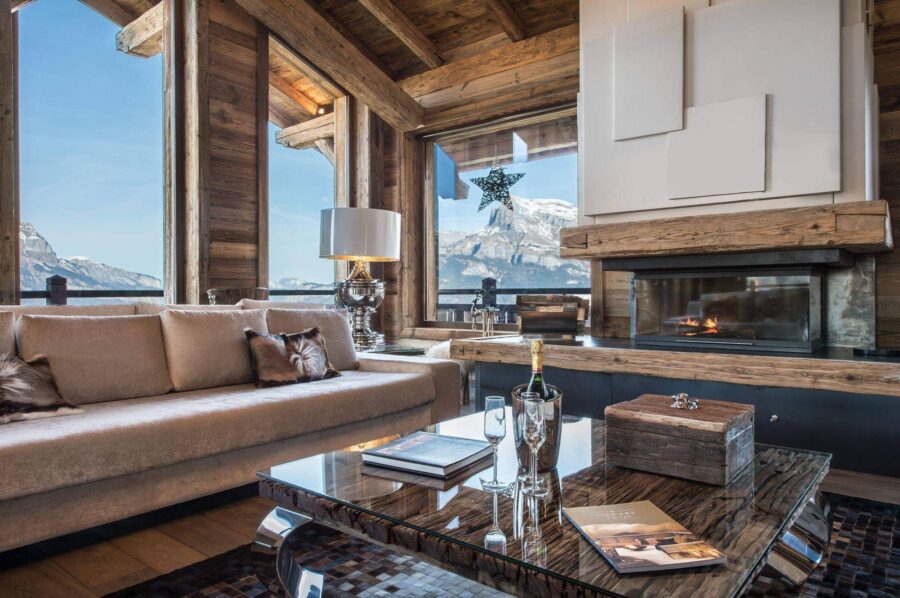 chalet-araceli-livingroom-fireplace-mountainview-sofa-luxury-alpine-design-megeve-princesse