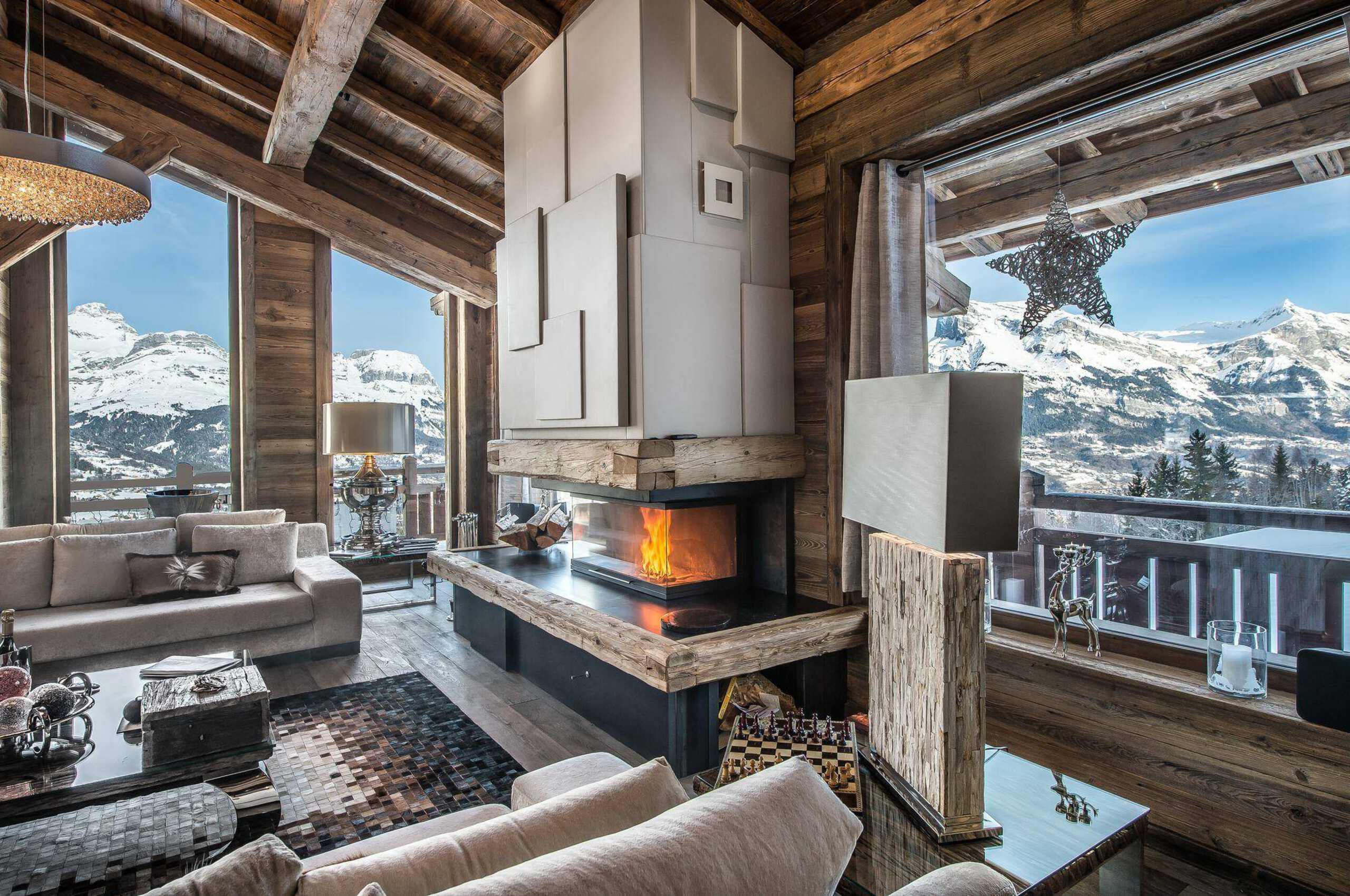 chalet-araceli-livingroom-stunning-mountain-view-fireplace-luxury-rental-retreat-megeve-princesse