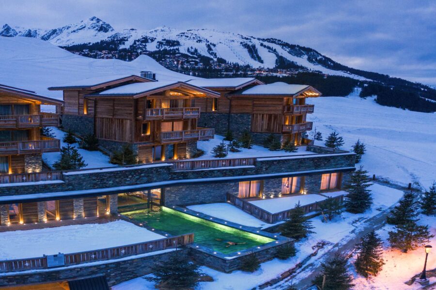 chalet-avery-exterior-night-outdoorpool-mountainviews-winter-snow-luxury-rental-property-courchevel1650