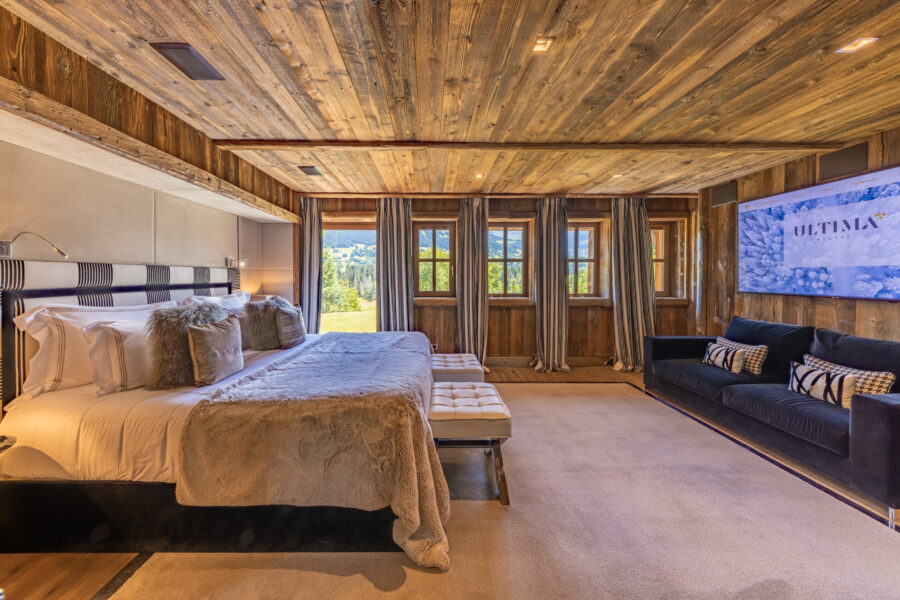 chalet-deuce-bedroom-garden-access-spacious-tv-sofa-modern-alpine-luxury-megeve
