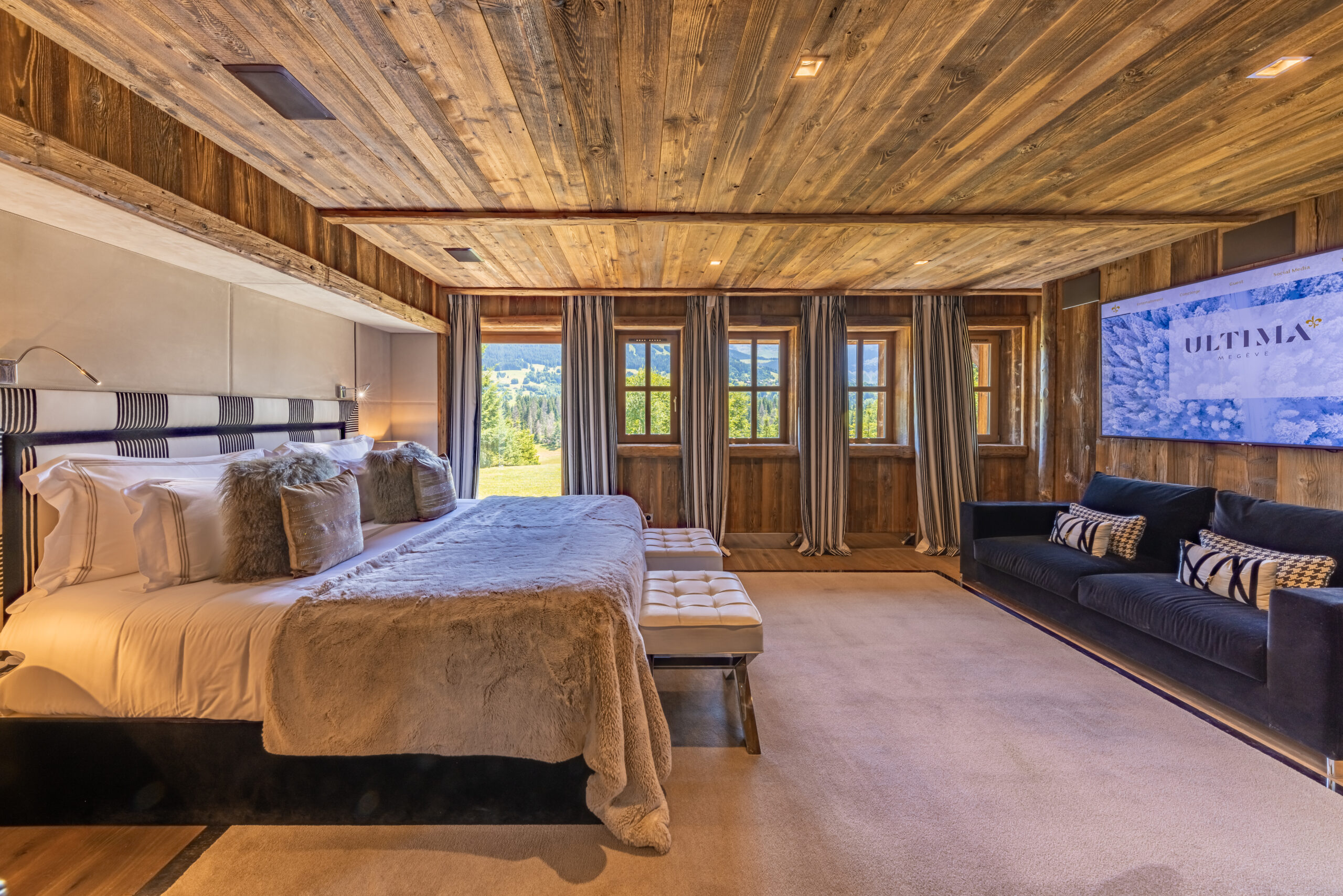 chalet-deuce-bedroom-garden-access-spacious-tv-sofa-modern-alpine-luxury-megeve