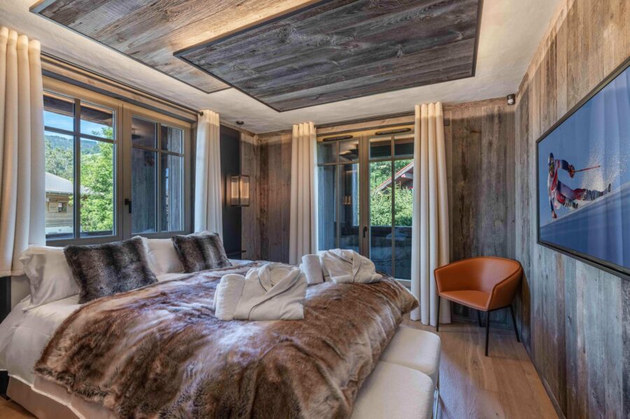 chalet-leia-bedroom-tv-cosy-modern-elegant-alpine-interior-luxury-rental-property-megeve