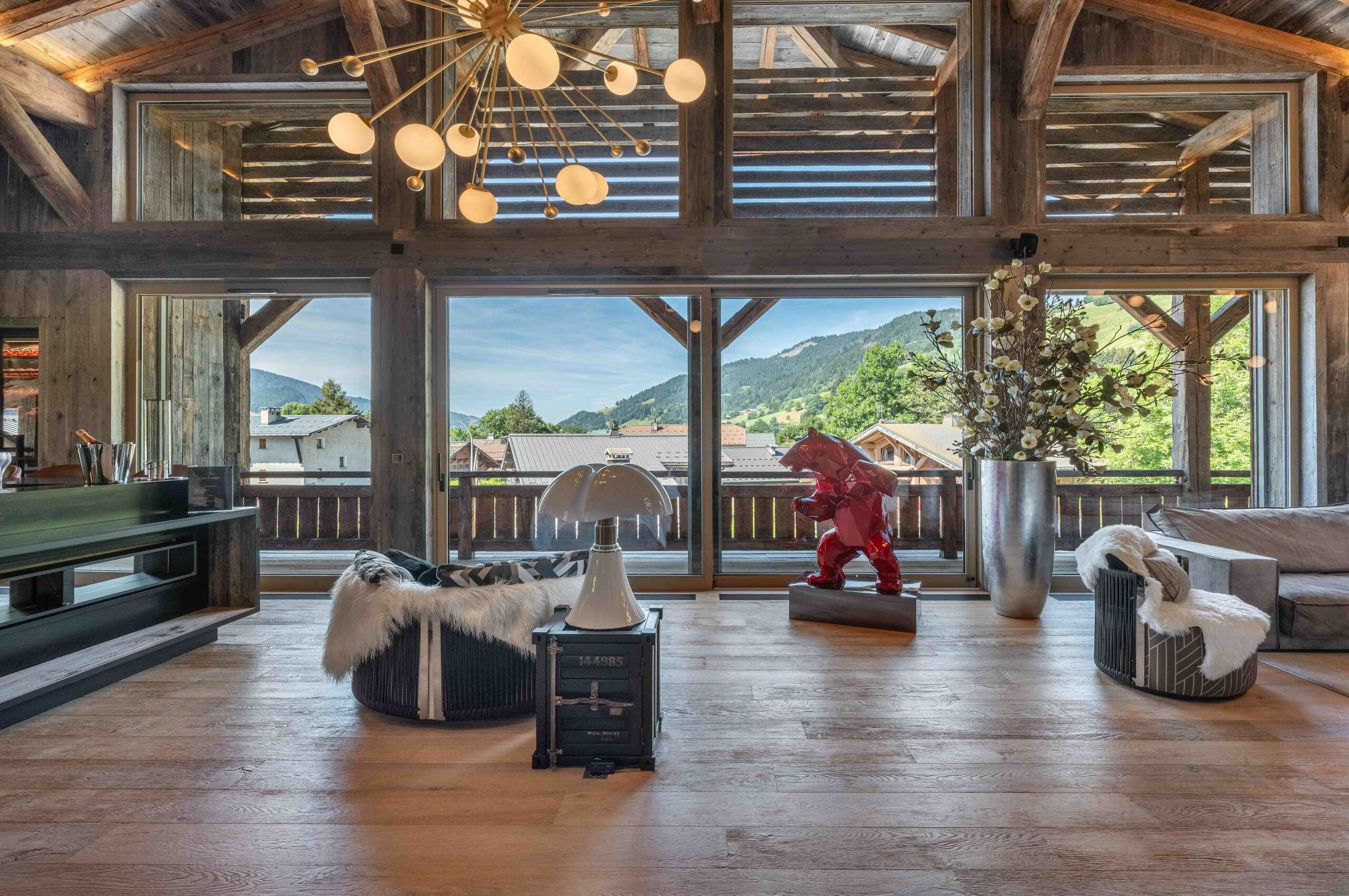 chalet-leia-living-area-unqiue-artwork-bespoke-design-modern-furnishings-luxury-rental-property-megeve