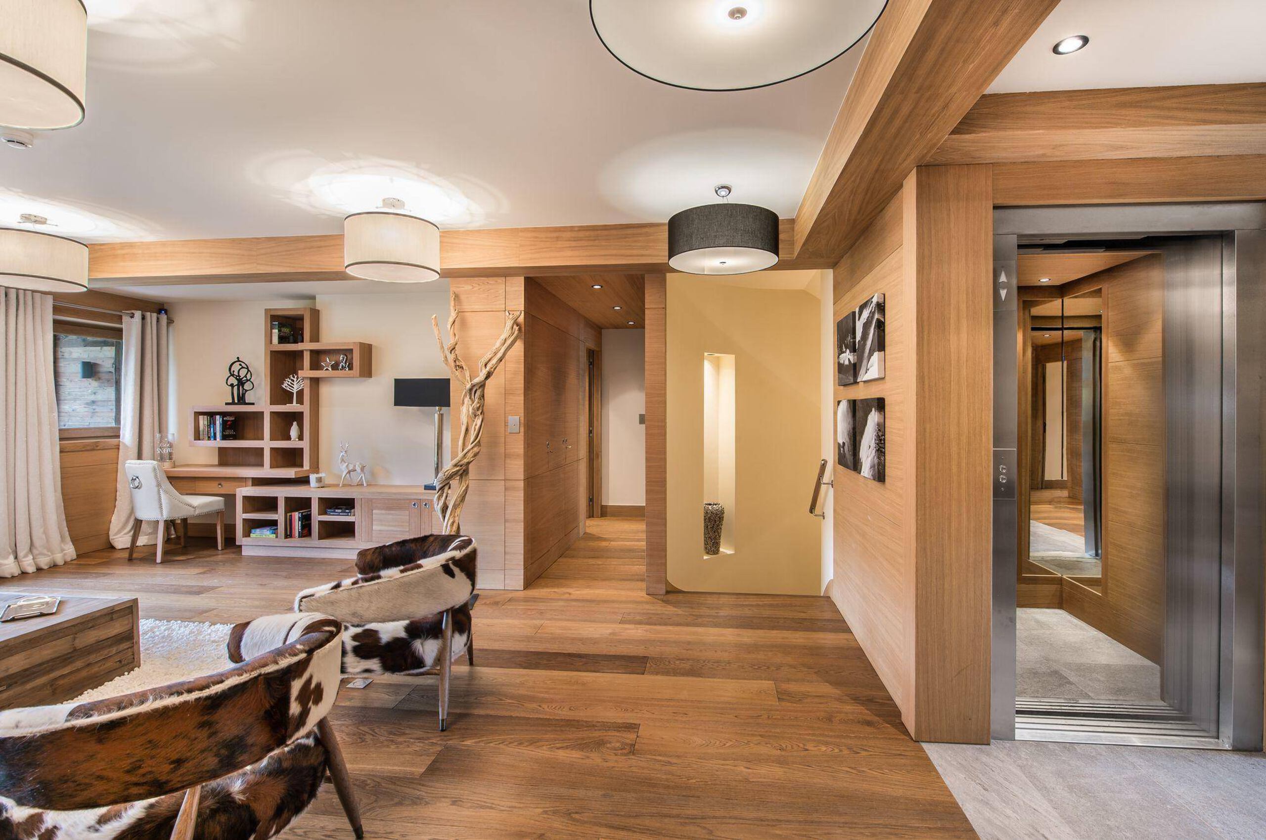 chalet-malorie-interior-hallway-lift-elevator-lounge-luxury-design-megeve