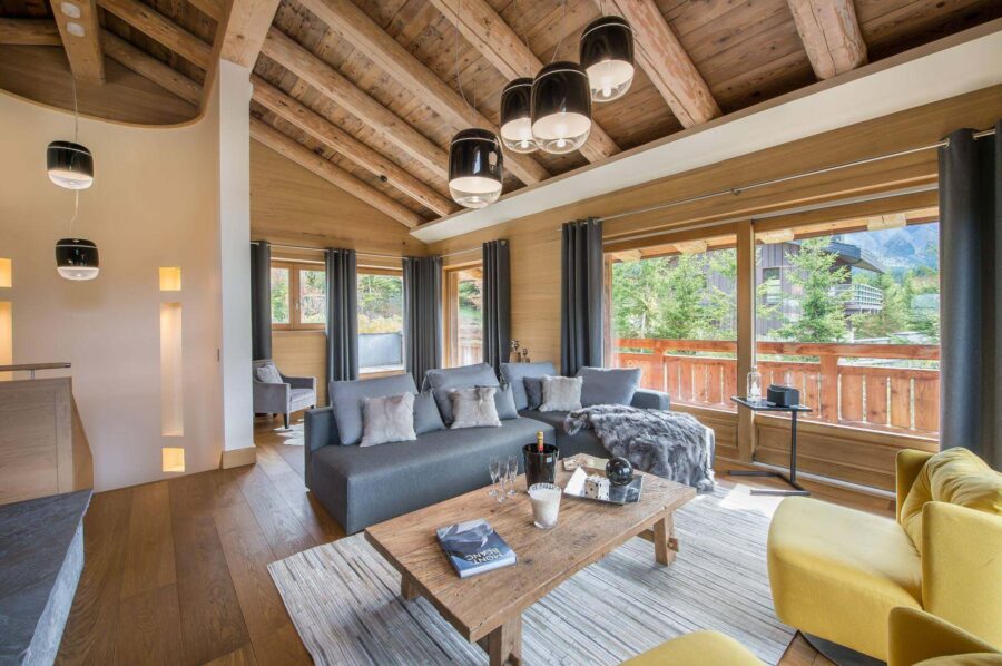 chalet-malorie-livingroom-lounge-balcony-scenicviews-modern-alpine-elegant-design-megeve