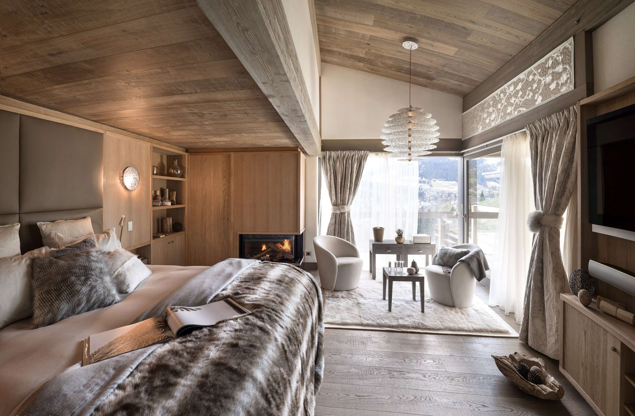 chalet-marianne-bedroom-fireplace-lounge-cosy-elegant-alpine-luxury-interiors-megeve