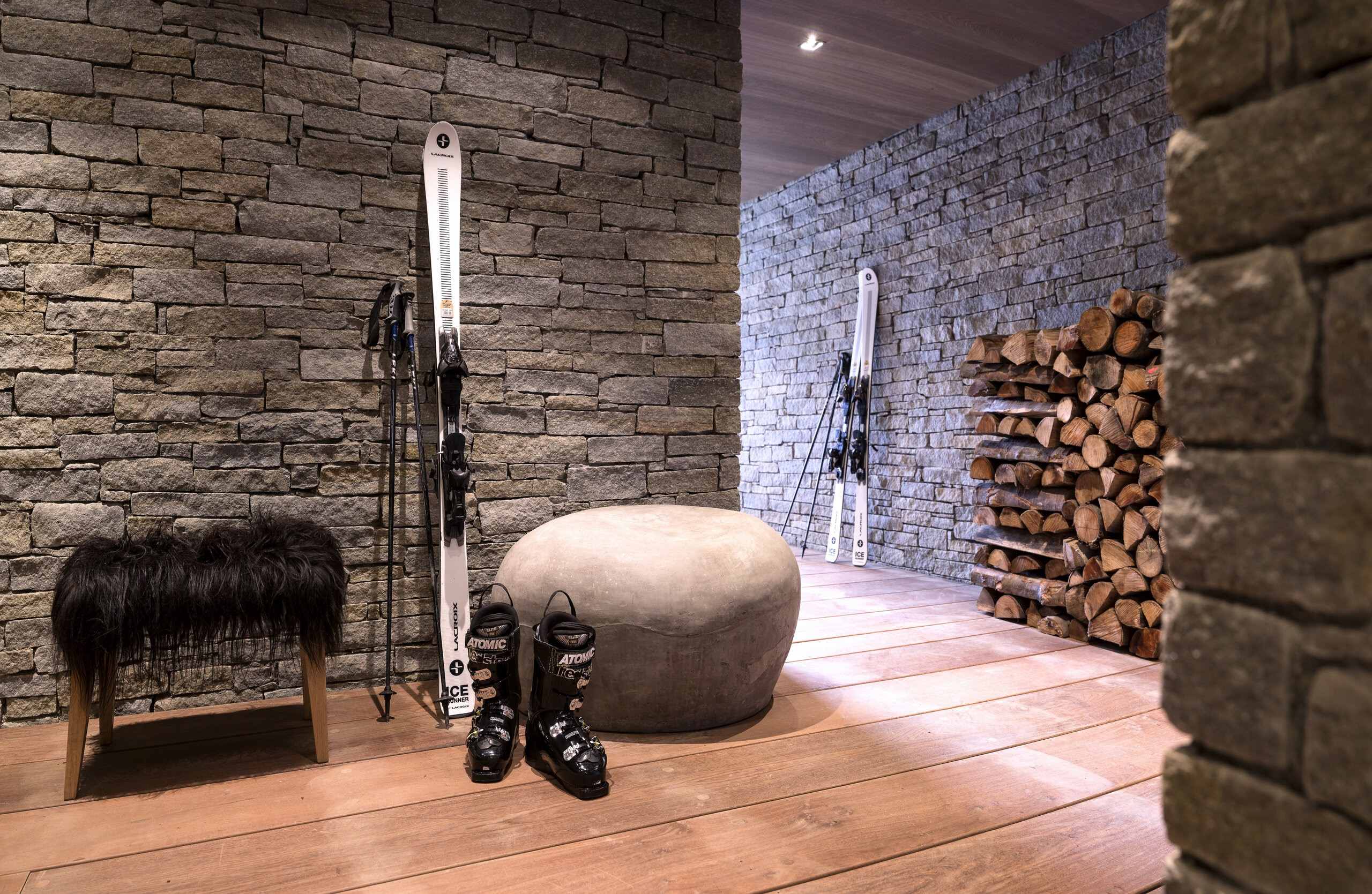 chalet-marianne-bootroom-wood-store-skiroom-skiin-skiout-luxury-alpine-retreat-megeve