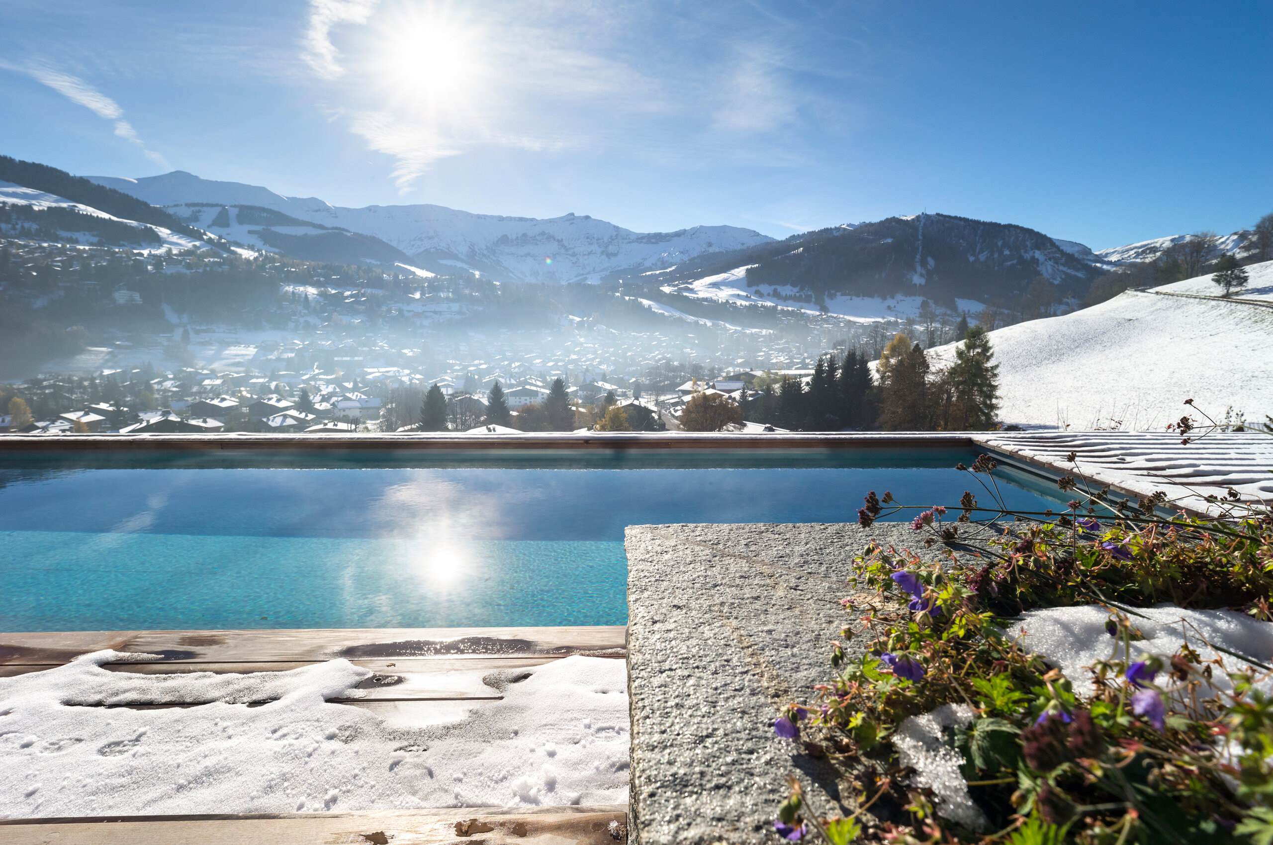 chalet-marianne-exterior-outdoor-swimming-pool-mountain-views-winter-snow-luxury-rental-retreat-megeve