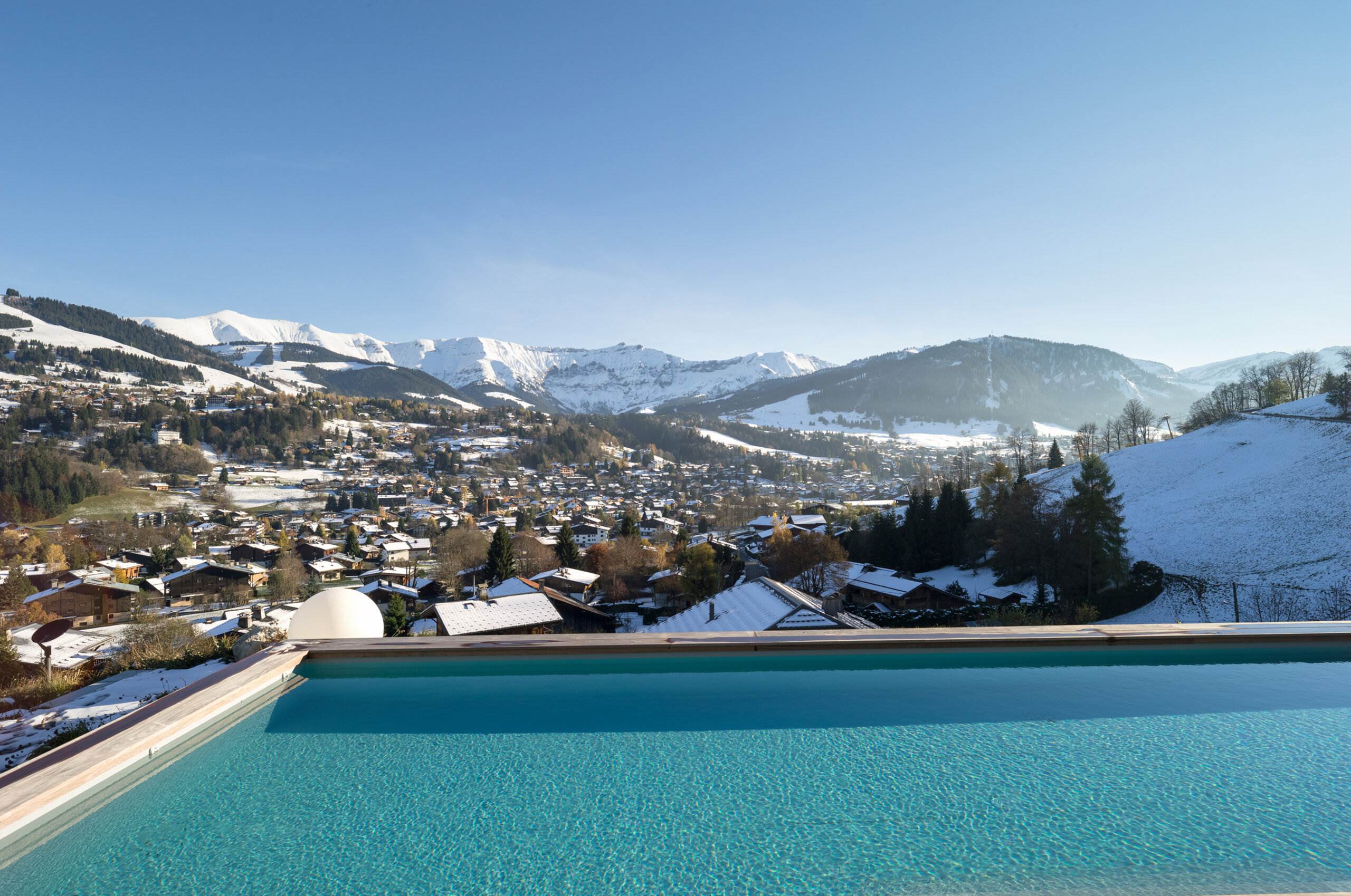 chalet-marianne-outdoor-swimming-pool-mountain-views-winter-luxury-alpine-retreat-megeve