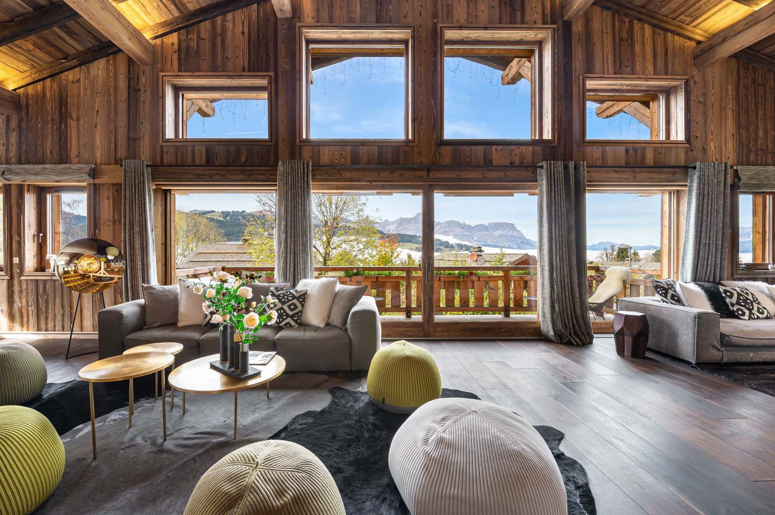 chalet-olga-mainpage-livingroom-openplan-spacious-modern-alpine-luxury-interior-megeve