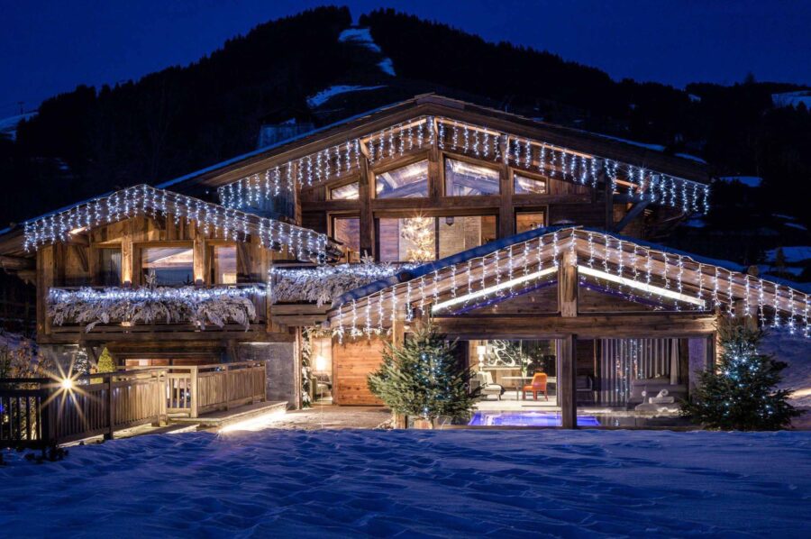 chalet-sabine-exterior-night-christmas-mountains-luxury-alpine-rental-retreat-megeve