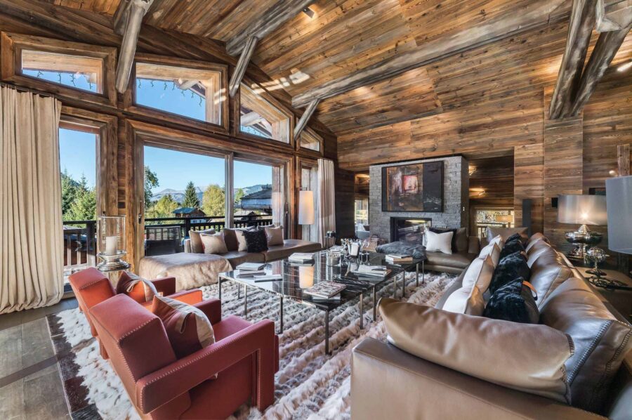 chalet-sabine-mainpage-livingroom-large-spacious-openplan-highceiling-luxury-alpine-interior-megeve