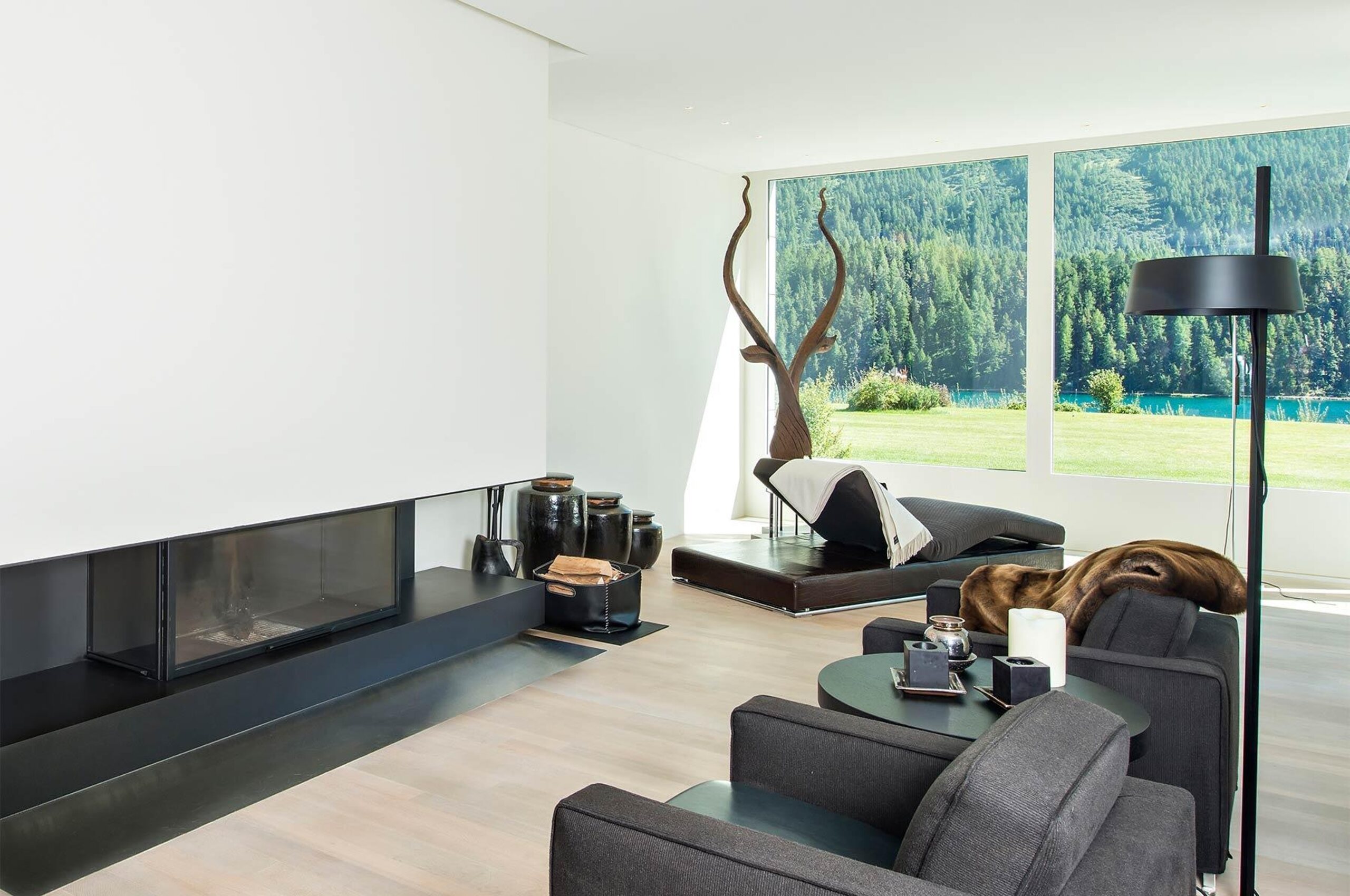 chalet-val-fireplace-lounge-lakeview-mountainview-modern-luxury-interior-stmoritz