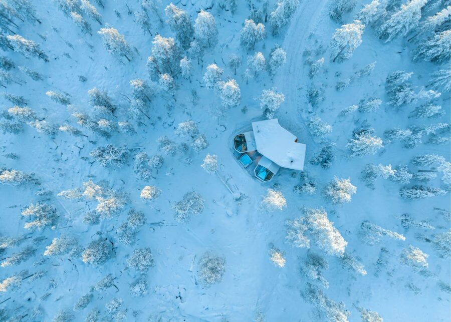 residence-indigo-aerial-exterior-winter-woodland-paradise-luxury-rental-retreat-lapland