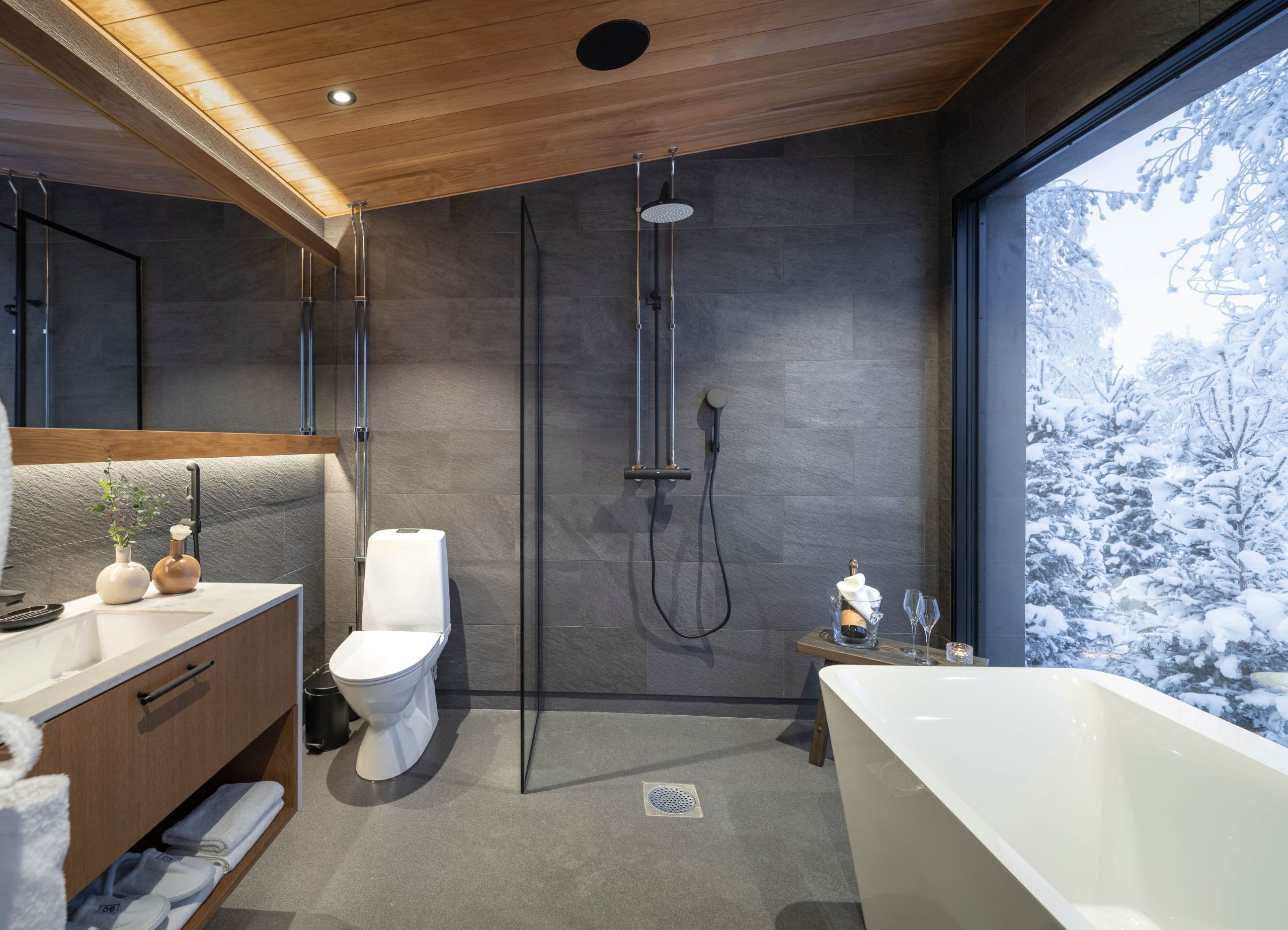 residence-indigo-bathroom-bathtub-shower-scenic-views-modern-sleek-design-luxury-lapland