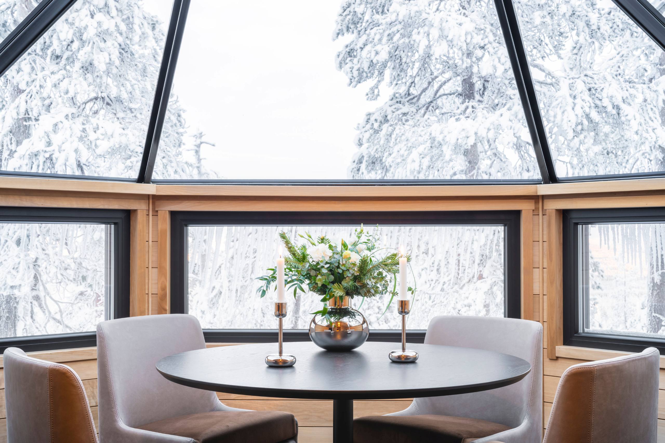 residence-indigo-diningroom-daytime-winter-skylight-bright-scenic-woodland-views-luxury-rental-retreat-lapland