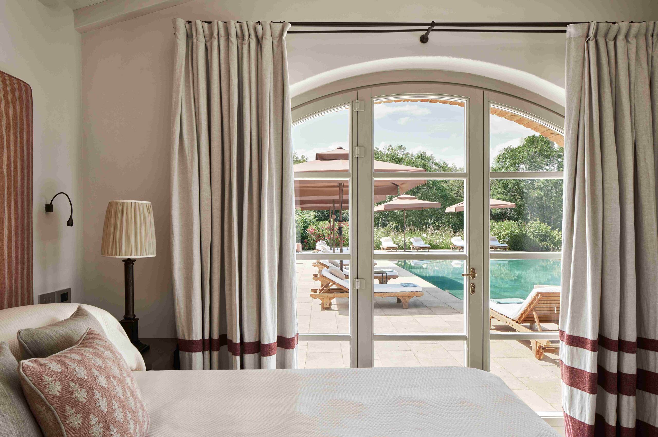 villa-asia-bedroom-poolview-modern-luxury-interior-tuscany
