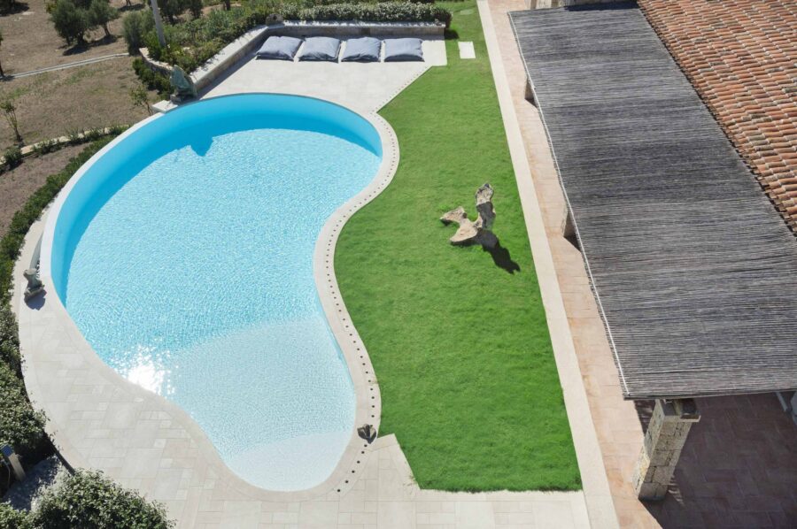 villa-callen-exterior-aerial-swimmingpool-garden-serne-tranquil-paradise-seaview-luxury-sardinia