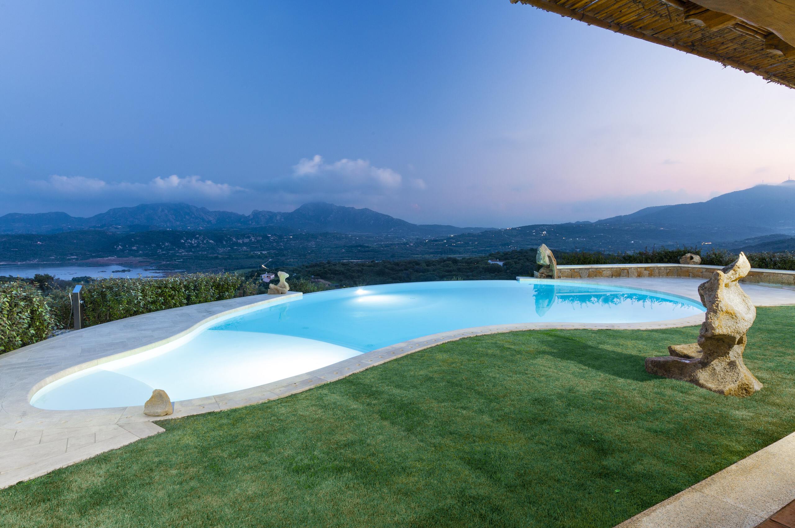 villa-callen-swimmingpool-scenic-mountain-seaview-landscape-spacious-garden-luxury-rental-retreat-sardinia