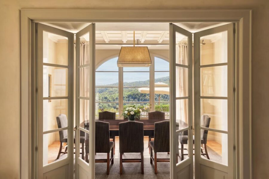 villa-chiara-dining-room-scenic-countryside-views-bright-serene-design-luxury-tuscany