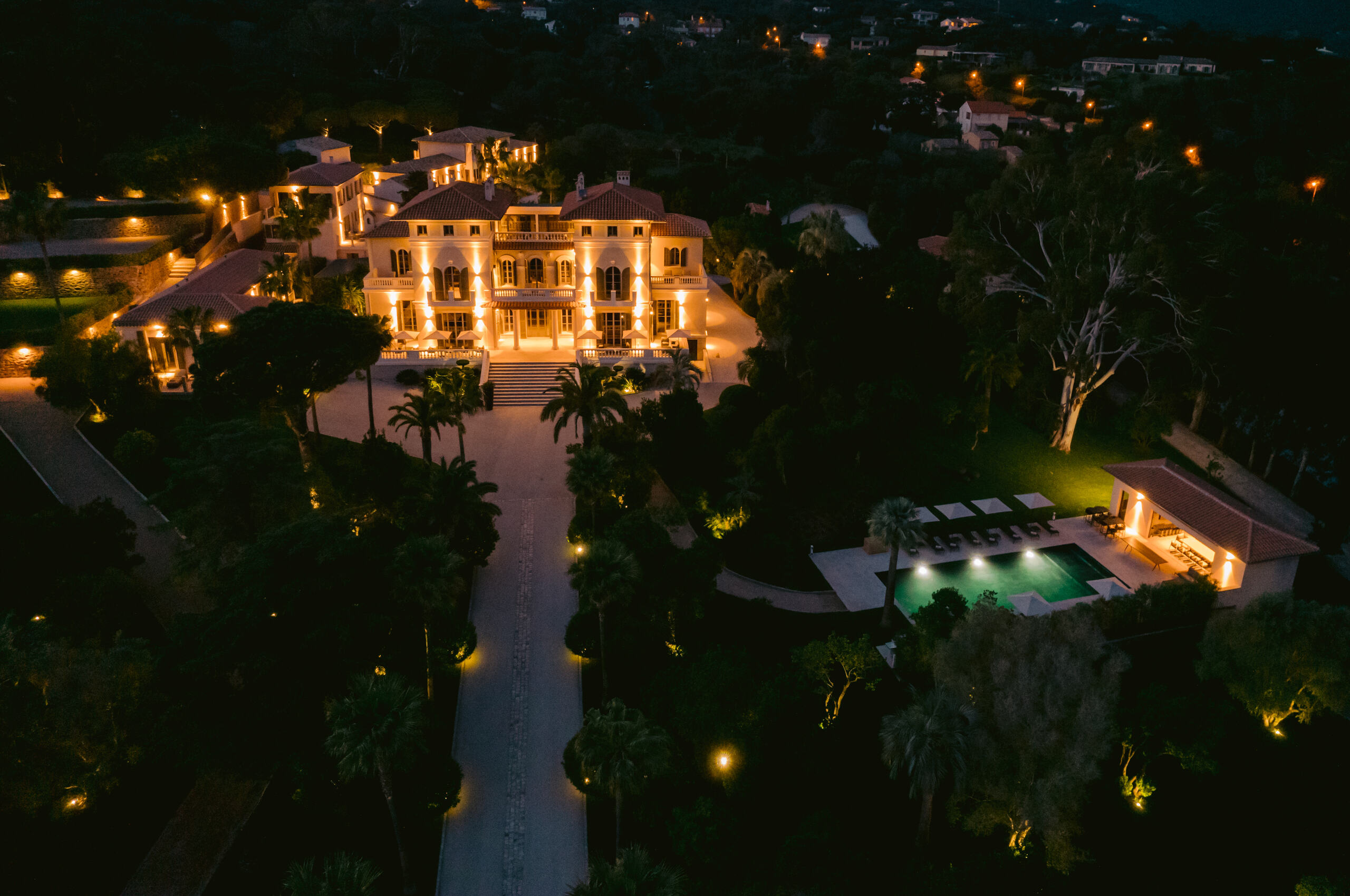villa-coralie-exterior-night-driveway-luxury-lacroixvalmer