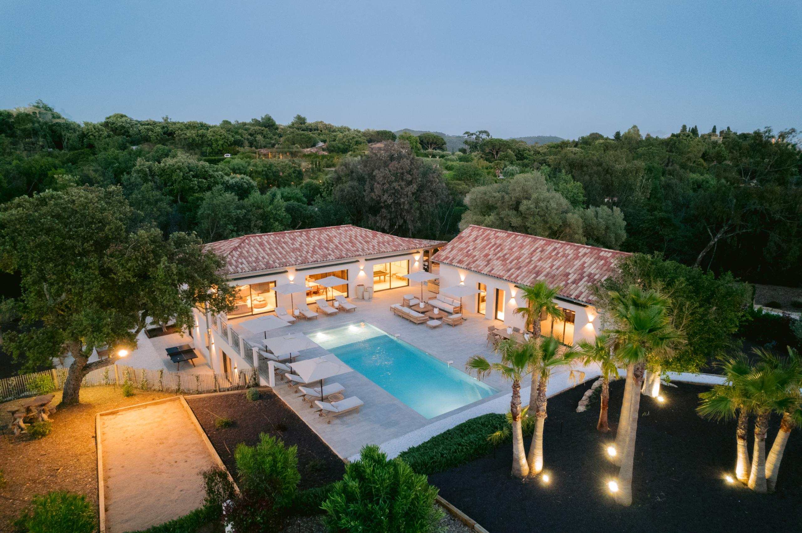 villa-corvina-exterior-night-swimming-pool-garden-terrace-luxury-lacroixvalmer