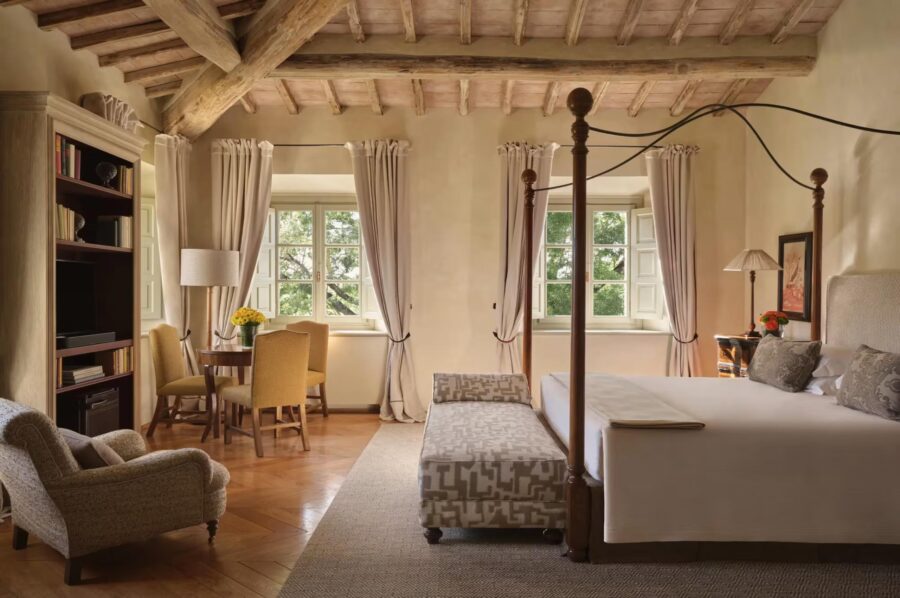 villa-edda-bedroom-fireplace-elegant-design-scenic-views-luxury-tuscany