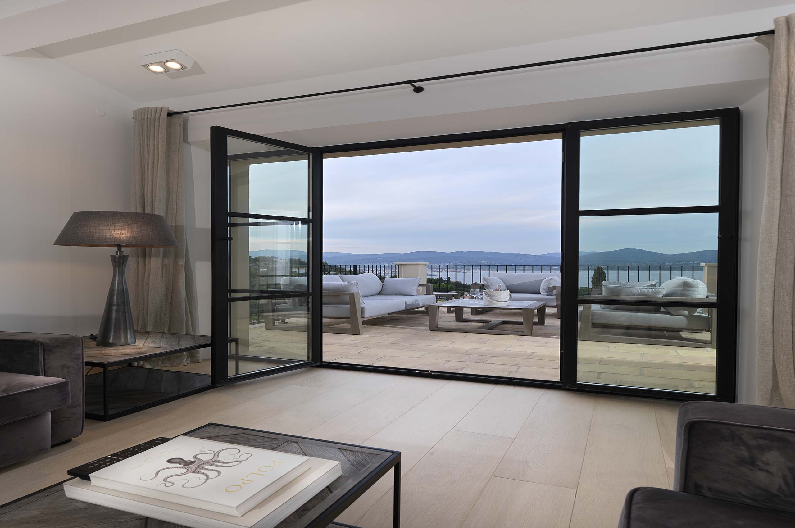villa-gia-livingroom-balcony-seaview-modern-luxury-interior-gassin