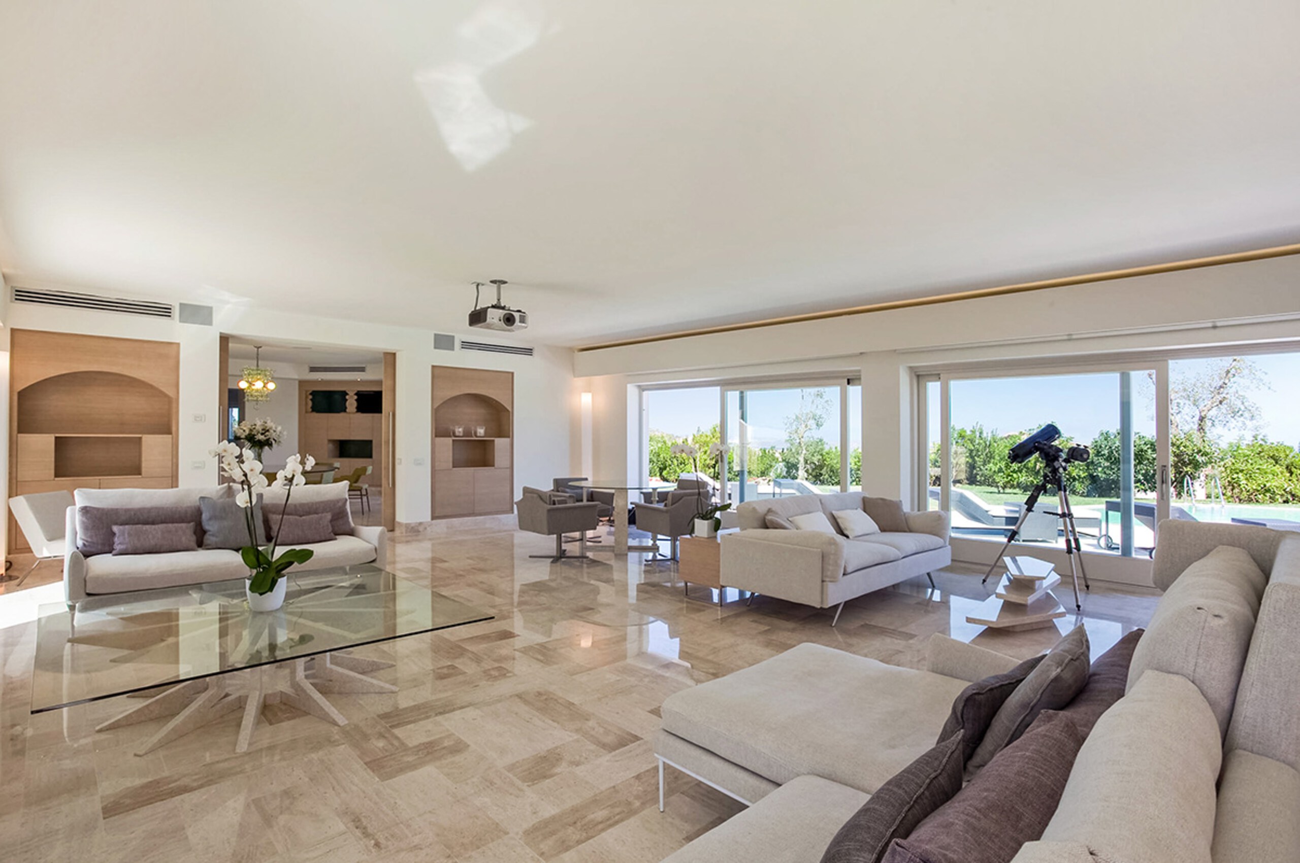 villa-mia-livingroom-lounge-spacious-gardenview-entertainment-hosting-luxury-sardinia