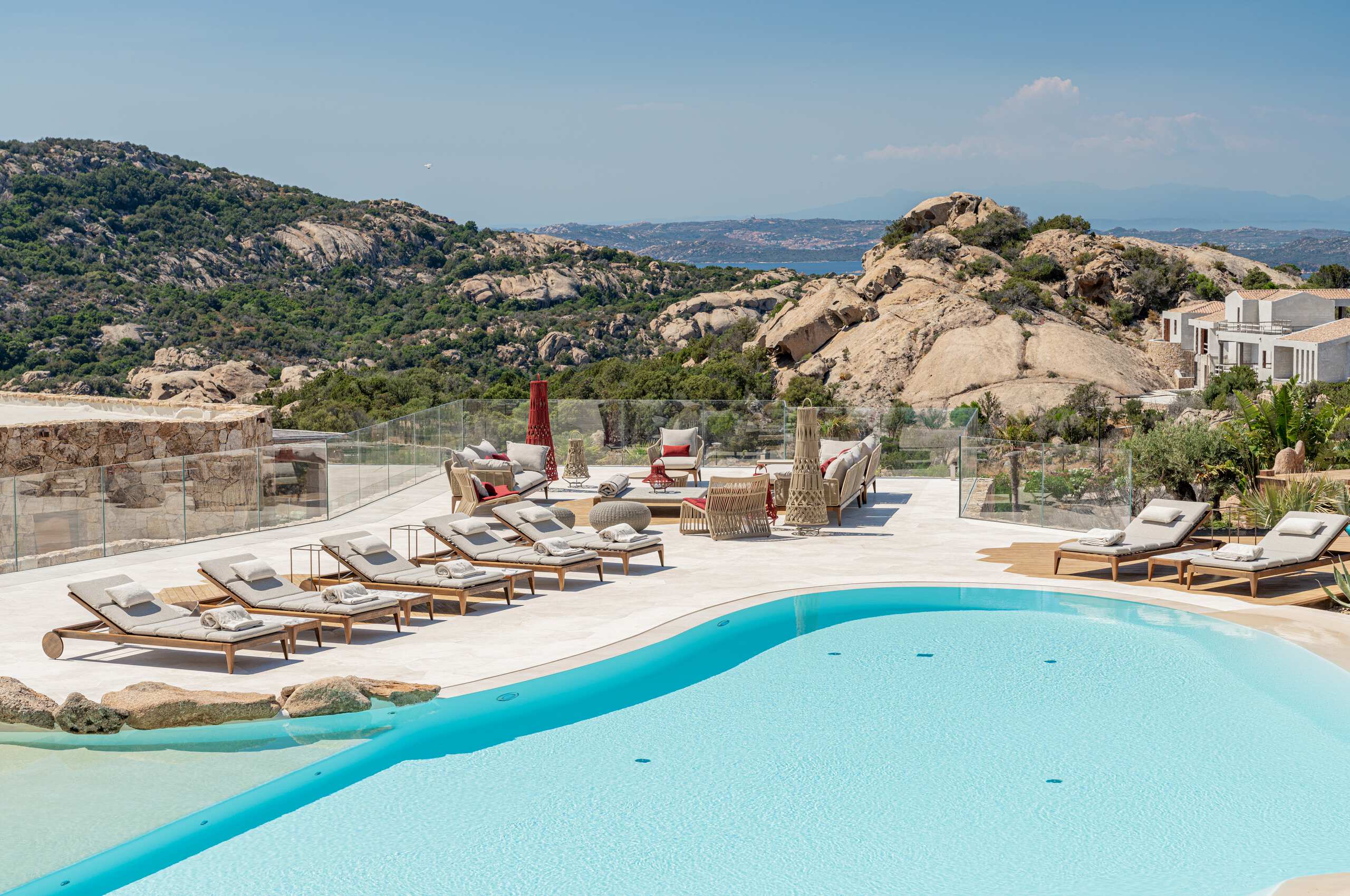 villa-miliania-swimmingpool-sunloungers-terrace-mountain-retreat-stunning-seaviews-unqiue-bespoke-design-luxury-property-sardinia