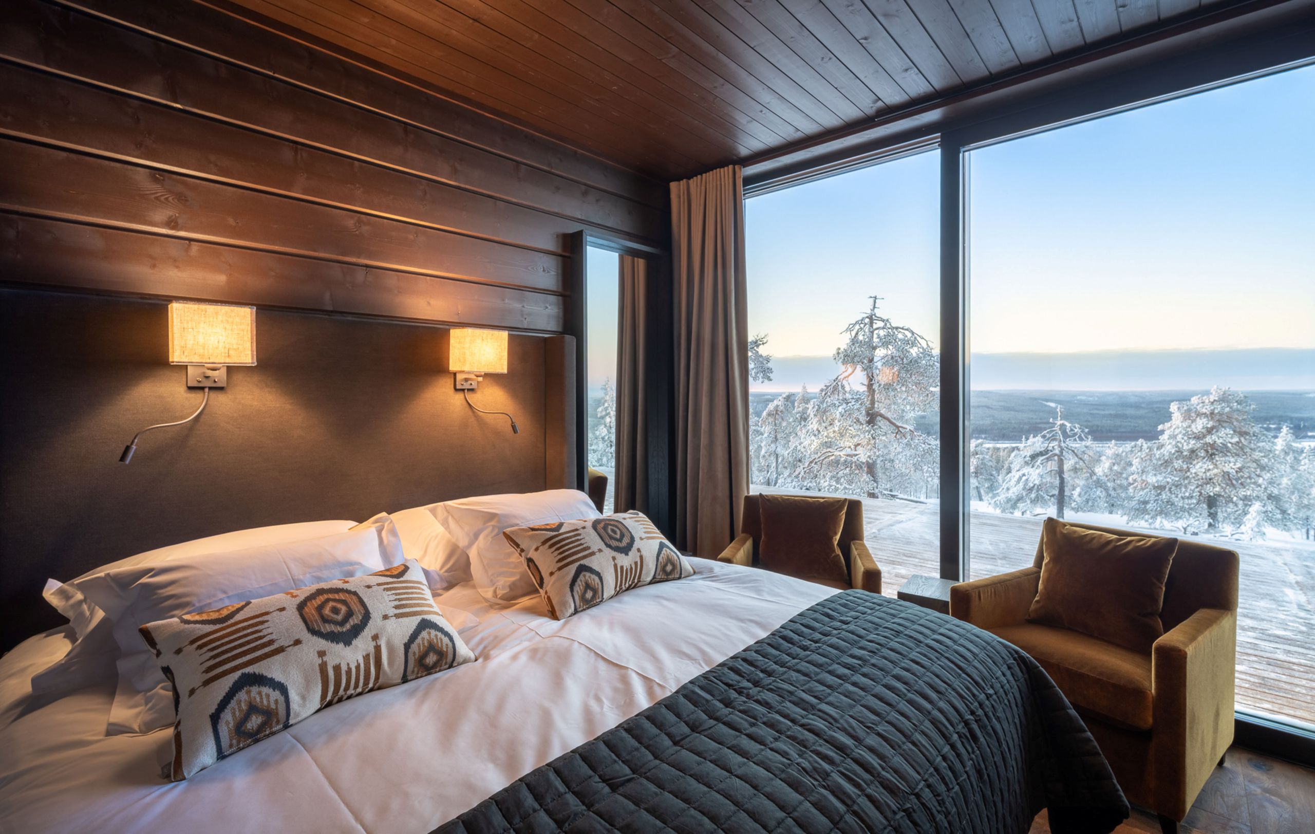 villa-octavia-bedroom-winter-scenic-woodland-views-cosy-alpine-interiors-luxury-rental-retreat-lapland