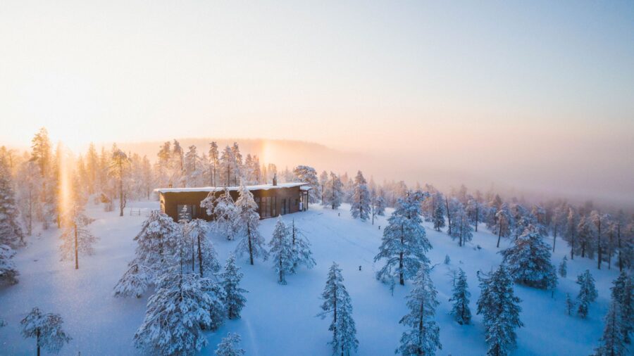 villa-octavia-exterior-winter-sunrise-luxury-rental-reteat-winter-wonderland-woodland-luxury-lapland