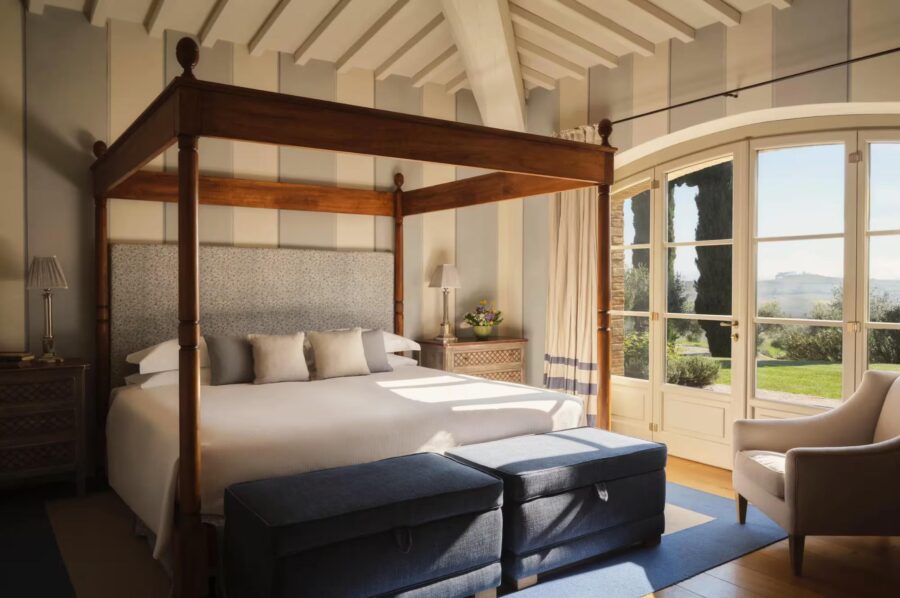 villa-odile-bedroom-scenic-garden-views-elegant-interior-design-luxury-tuscany