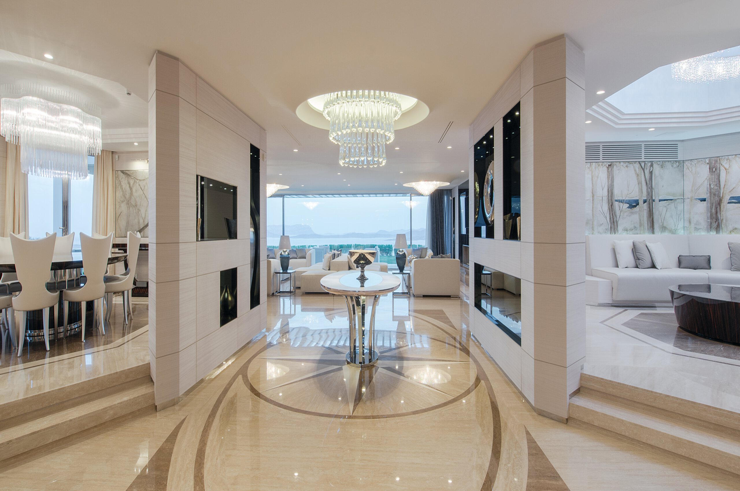 villa-paola-entrance-hall-openplan-diningarea-livingroom-seaview-modern-stylish-design-luxury-interior-sardinia