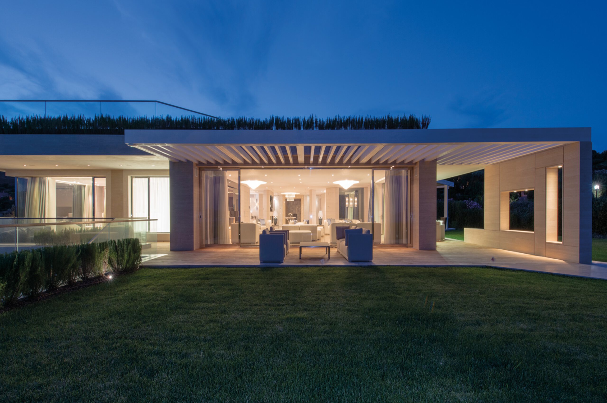 villa-paola-exterior-night-garden-stylish-architecture-luxury-rental-property-sardinia