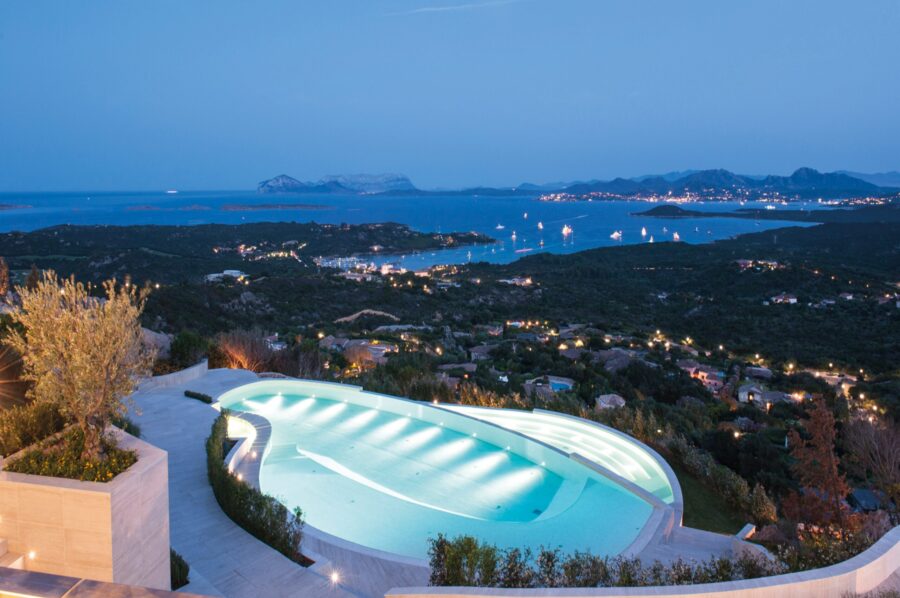 villa-paola-exterior-night-large-swimmingpool-stunning-scenic-seaviews-landscape-luxury-rental-sardinia