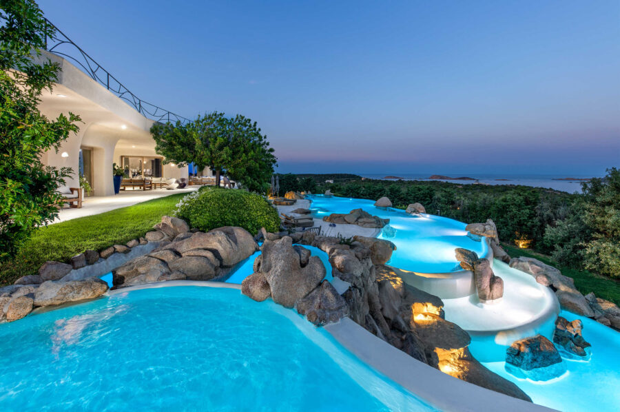 villa-saphira-swimmingpool-tiered-luxury-pool-seaview-night-sardinia