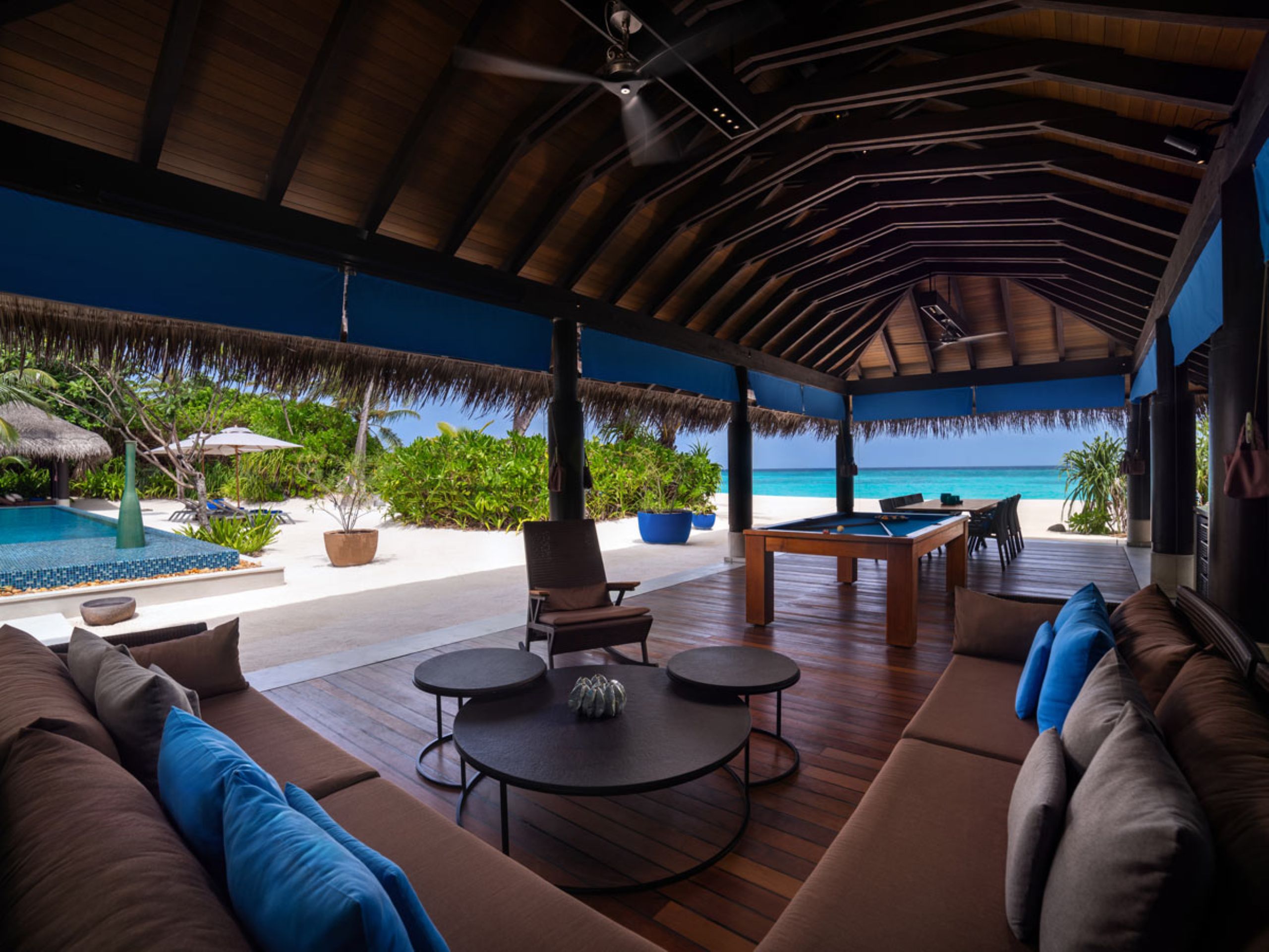 villa-vee-exterior-covered-outdoor-lounge-games-dining-seaview-beachfront-luxury-rental-retreat-maldives