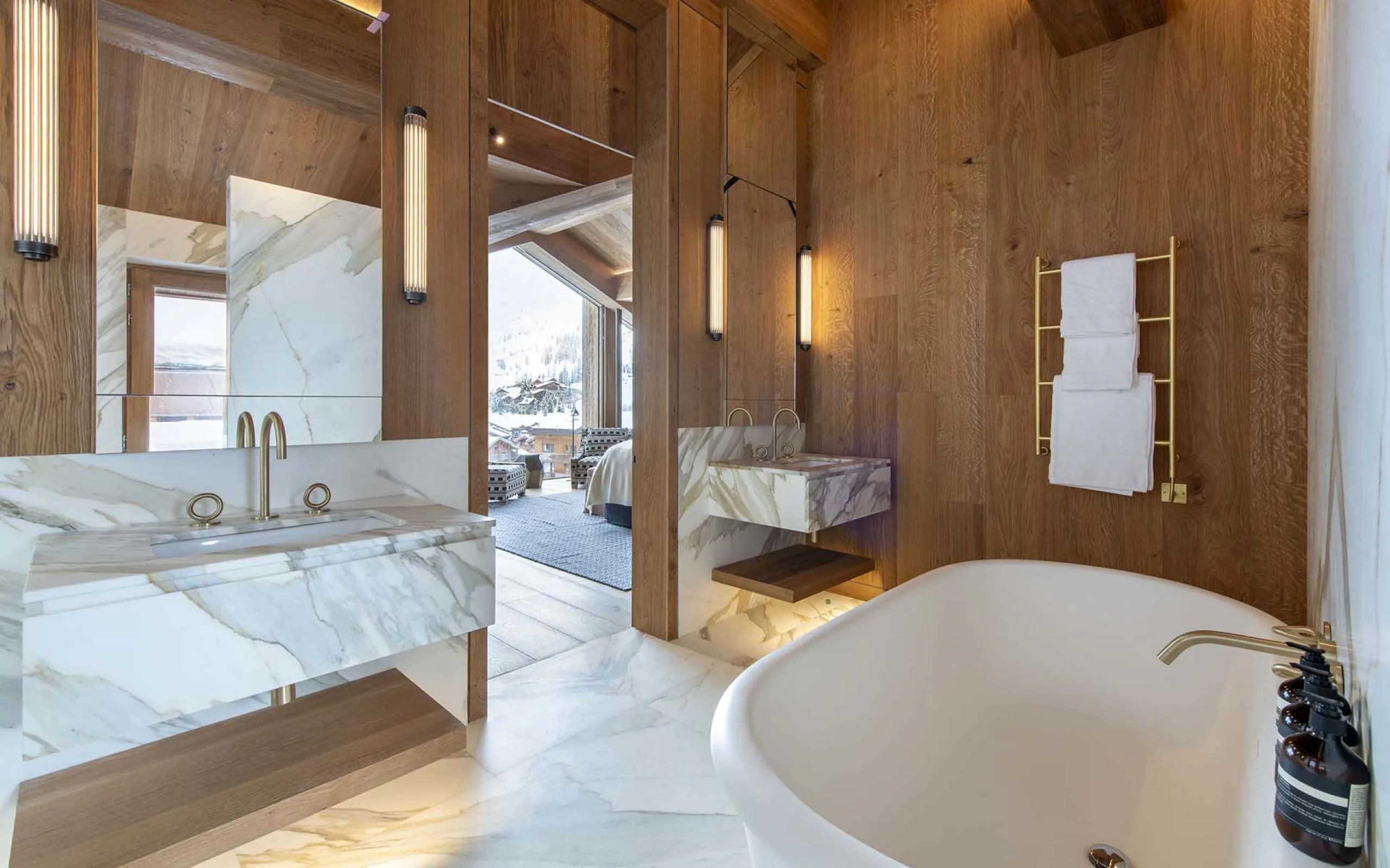 chalet-esme-bathroom-bathtub-double-sink-mountain-view-marble-sleek-modern-luxury-design-vald'isere