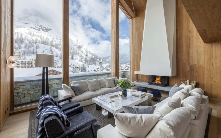 chalet-esme-living-room-lounge-fireplace-mountain-views-luxury-alpine-interior-design-vald'isere