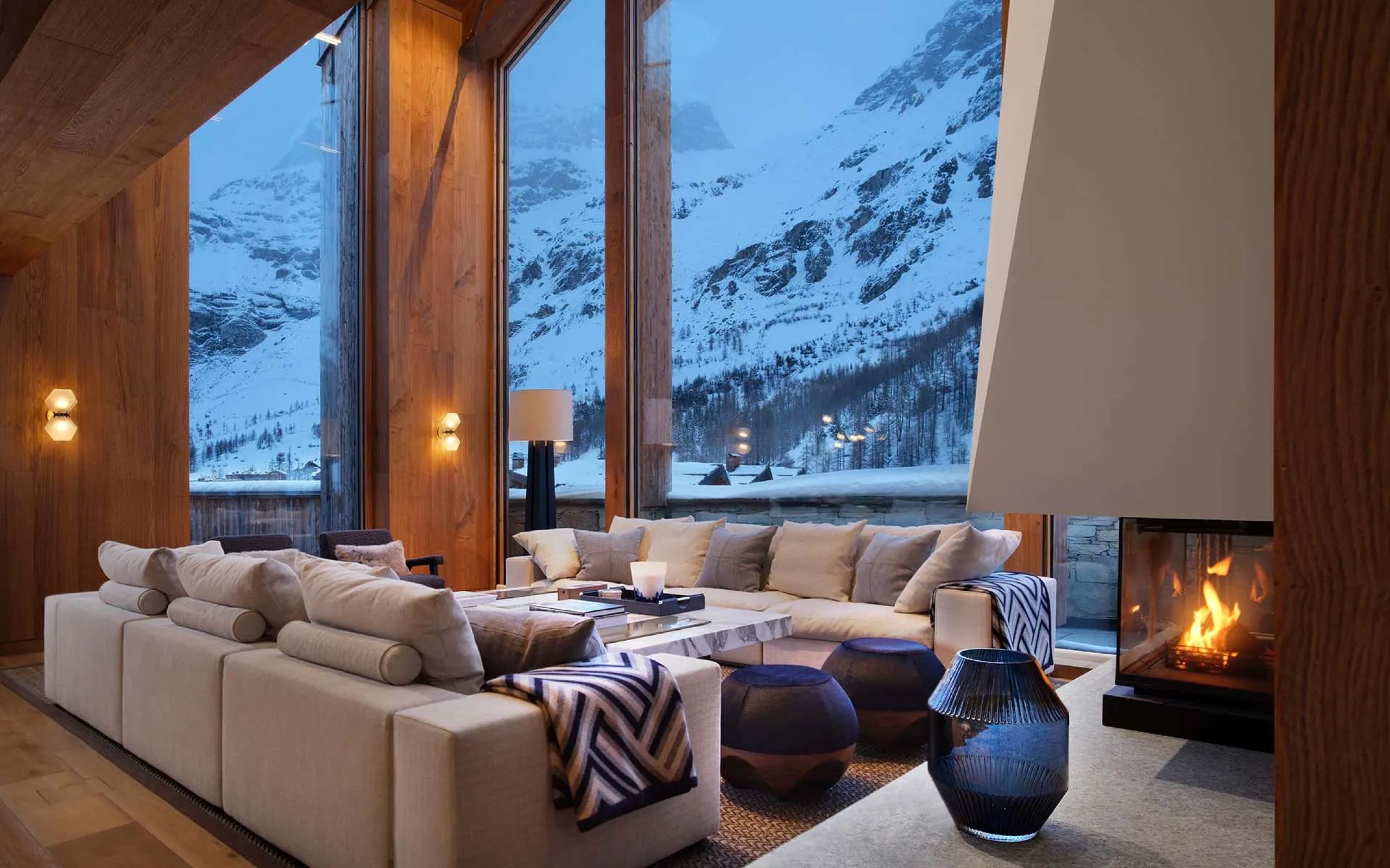 chalet-esme-livingroom-lounge-stunning-mountain-views-fireplace-heigh-ceilings-luxury-alpine-interiors-vald'isere
