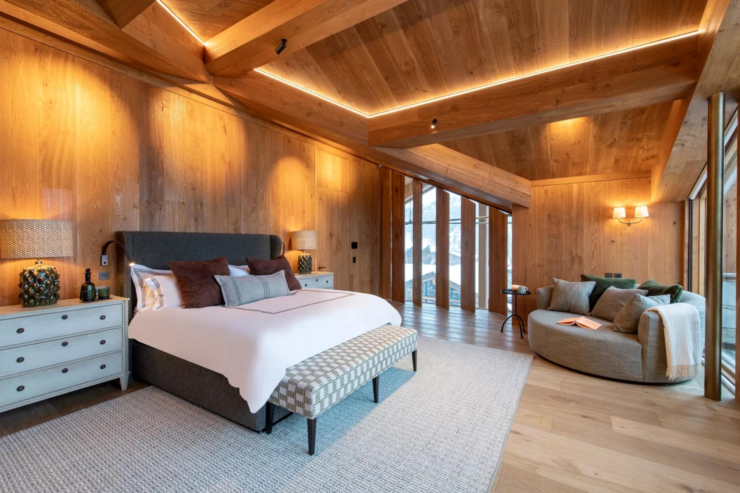 chalet-eva-bedroom-spacious-scenic-views-elegant-modern-alpine-interior-design-luxury-retreat-vald'isere