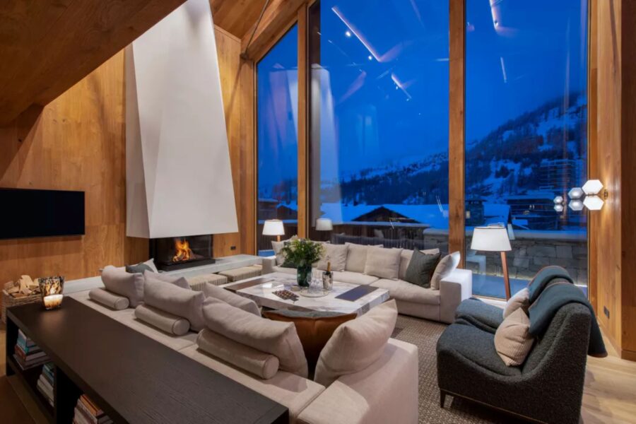 chalet-eva-livingroom-lounge-night-scenic-views-fireplace-modern-alpine-interiors-luxury-retreat-vald'isere